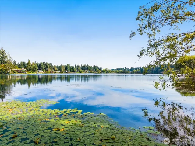 a view of a lake with a lake in the background
