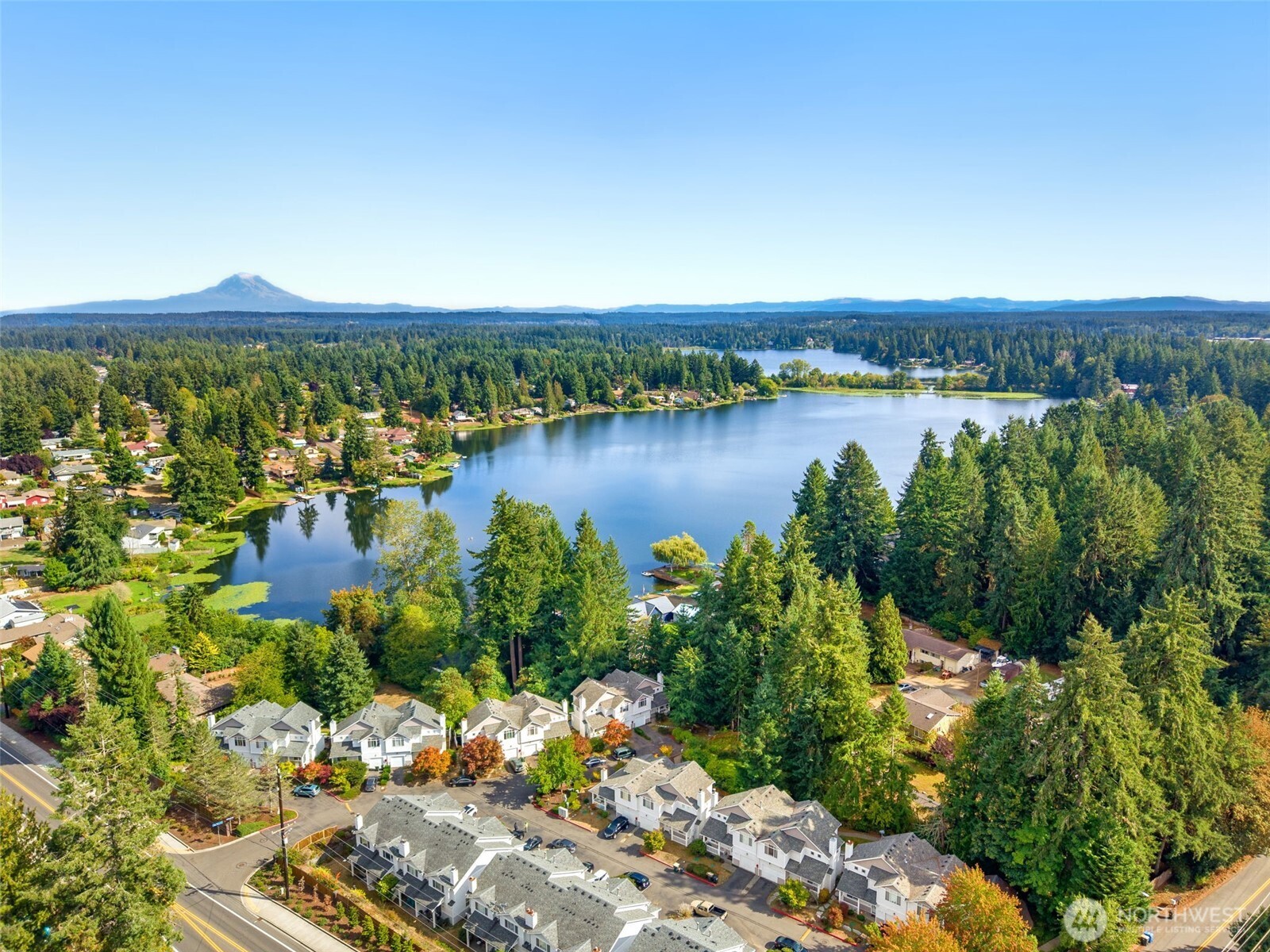 4748 Lakeshore Lane Southeast, Unit B Olympia, WA 98513 - Photo 31 of 31 a view of a lake with a city