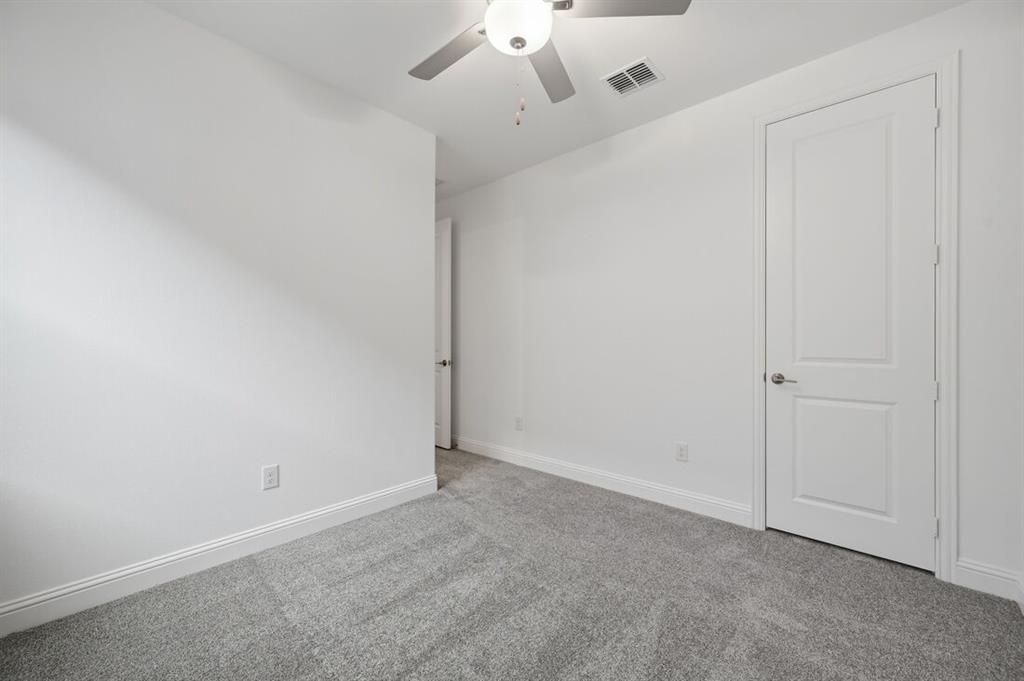 1604 Victory Circle Justin, TX 76247 - Photo 17 of 40 a view of an empty room