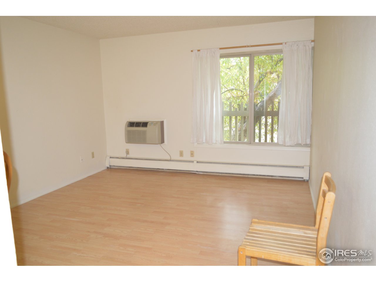 2707 Valmont Road, Unit 202B Boulder, CO 80304 - Photo 2 of 15 a view of wooden floor and windows in a room