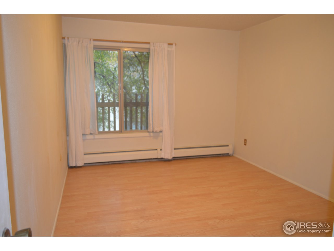 2707 Valmont Road, Unit 202B Boulder, CO 80304 - Photo 4 of 15 a view of an empty room with a window