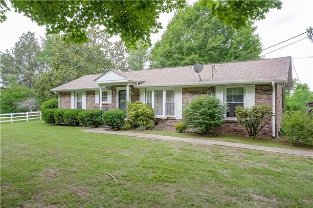 3957 Baxter Road Joelton, TN 37080 - Photo 1 of 20 Front View of this all brick home on approx. 2 acres with mature trees and sunny Florida Room