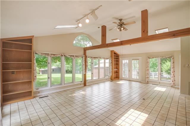 3957 Baxter Road Joelton, TN 37080 - Photo 4 of 20 Sunny Florida Room with tile flooring