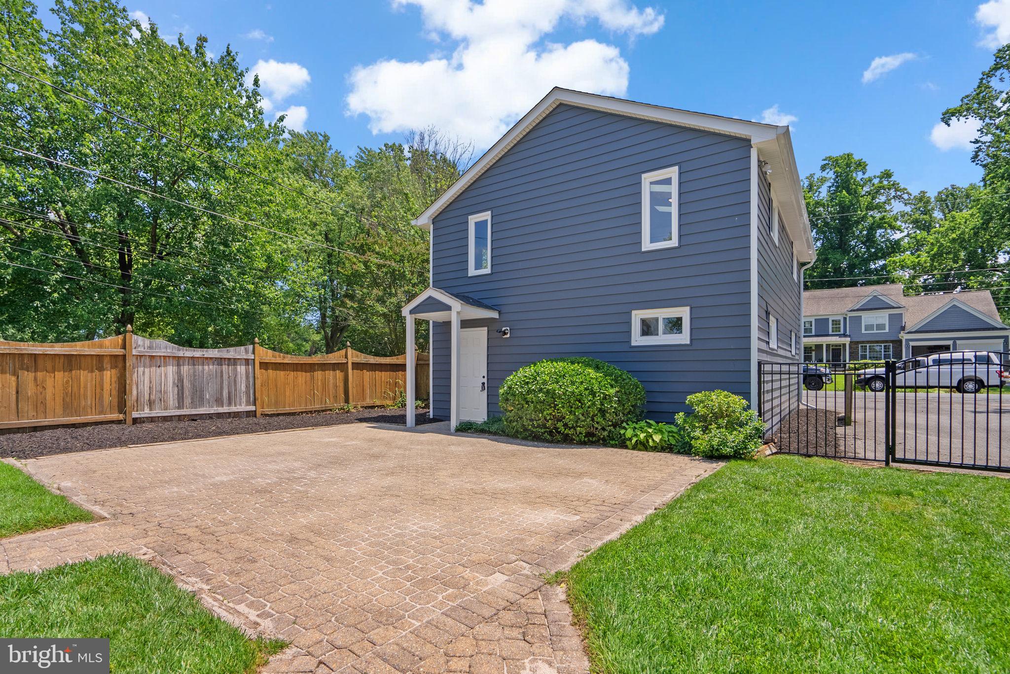 1088 River Bay Road Annapolis, MD 21409 - Photo 43 of 58 2 car garage with paver patio & apartment access