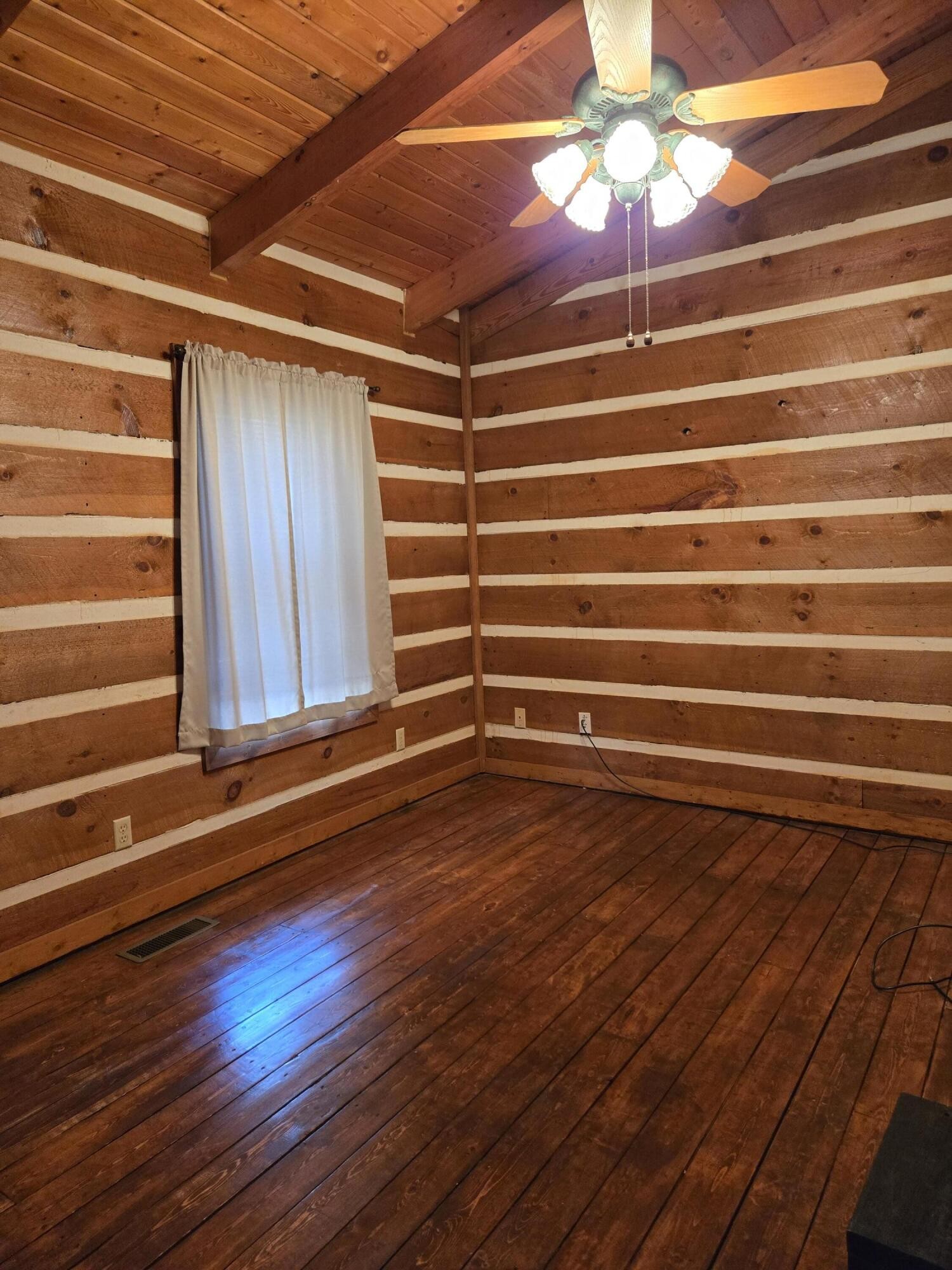 8441 Toestring Valley Road Spring City, TN 37381 - Photo 23 of 39 a view of room with stairs and wooden floor