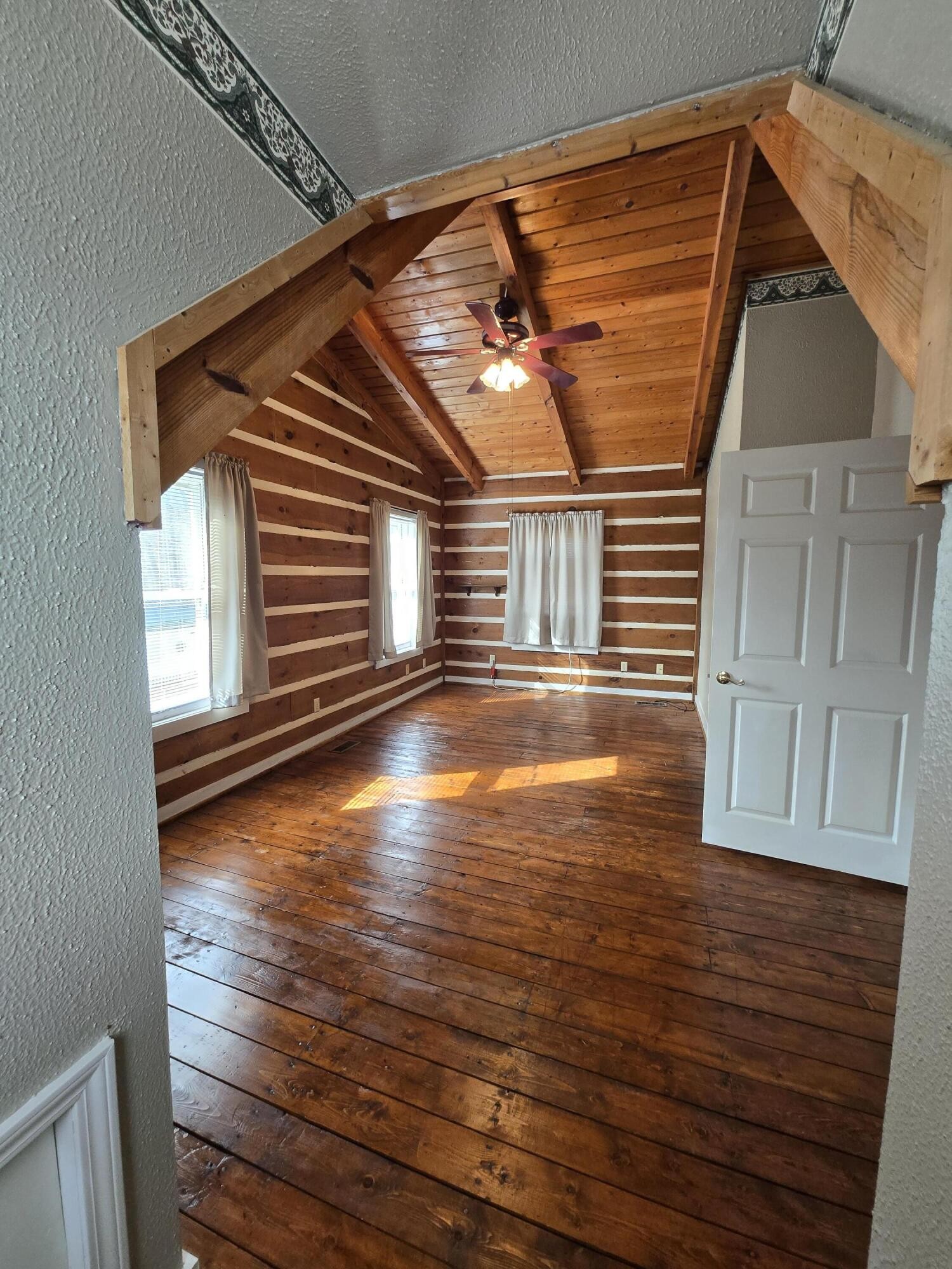 8441 Toestring Valley Road Spring City, TN 37381 - Photo 25 of 39 a view of a room with wooden floor and a window
