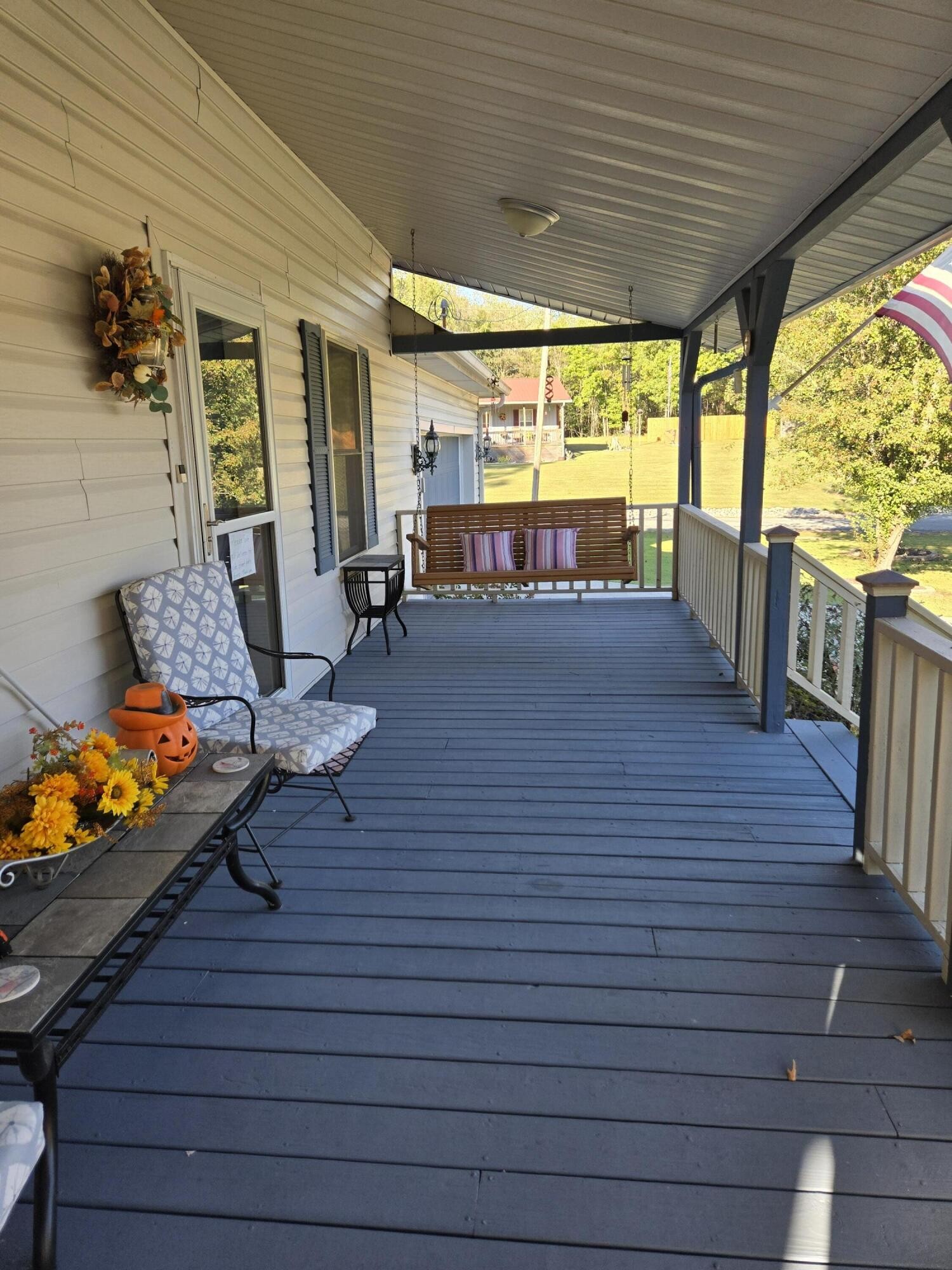 8441 Toestring Valley Road Spring City, TN 37381 - Photo 5 of 39 a living room with furniture floor to ceiling window and wooden floor
