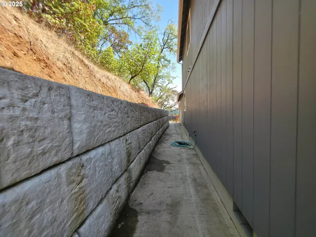 a view of a brick house with a large window