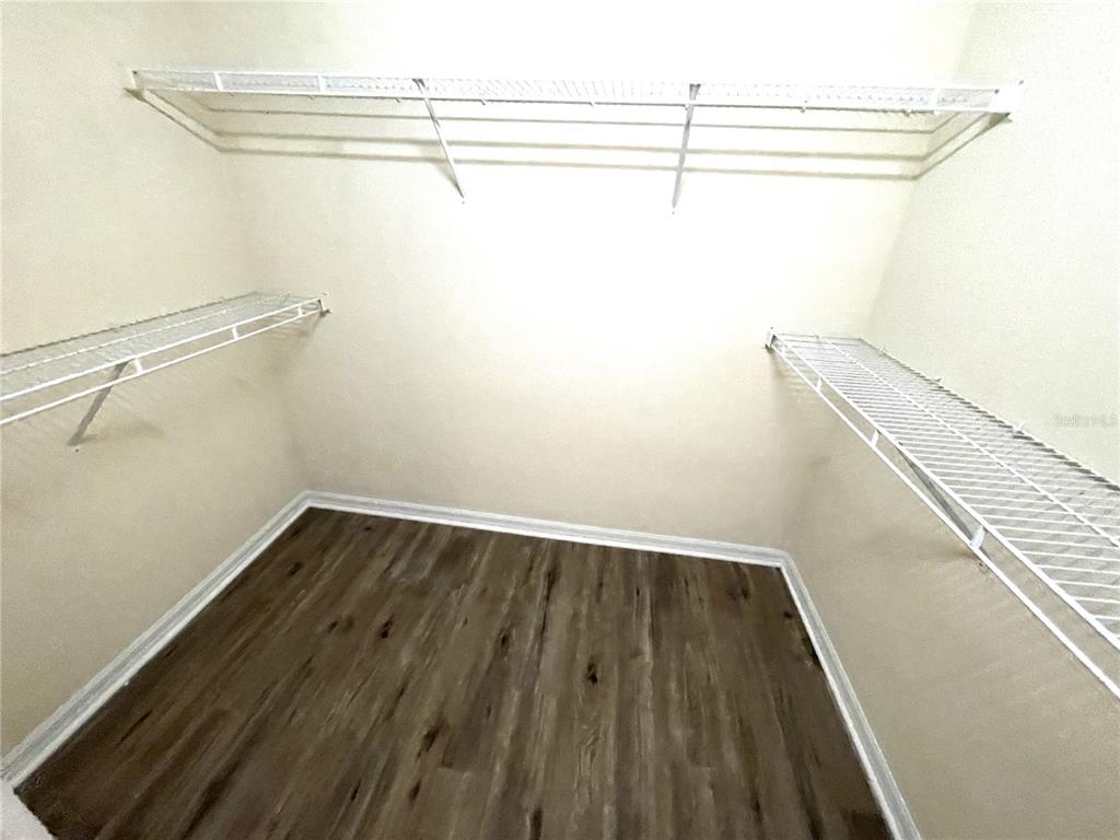 732 Bowman Terrace Port Charlotte, FL 33953 - Photo 7 of 14 a view of a room with racks on the wall