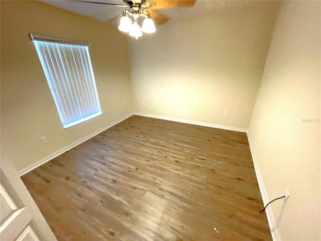 732 Bowman Terrace Port Charlotte, FL 33953 - Photo 10 of 14 a view of an empty room and window