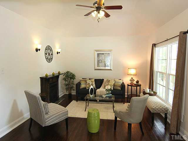 609 Latta Street Raleigh, NC 27607 - Photo 3 of 13 Windows in huge main living room bring in lots of light. Gleaming espresso hardwood floors. Living Room
