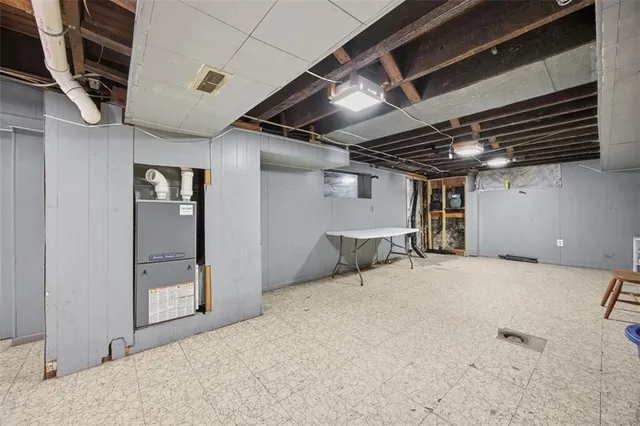 a view of a brick buildings with many windows