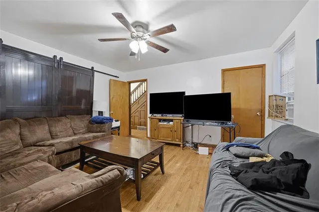 a living room with furniture and a couch