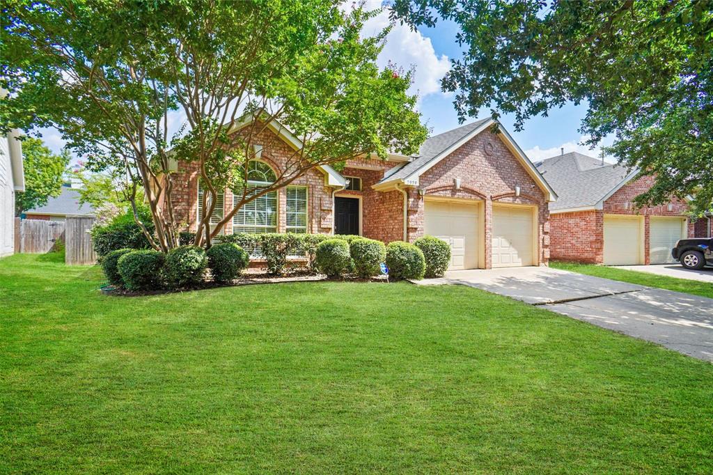 7979 Belladonna Drive Fort Worth, TX 76123 - Photo 1 of 1 View of front of property with concrete driveway, brick siding, an attached garage, and roof with shingles