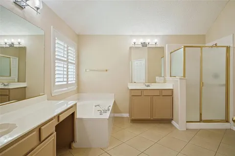 a bathroom with a sink a toilet and a tub