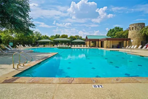 a view of an outdoor space and swimming pool