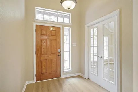 wooden floor and windows in a room