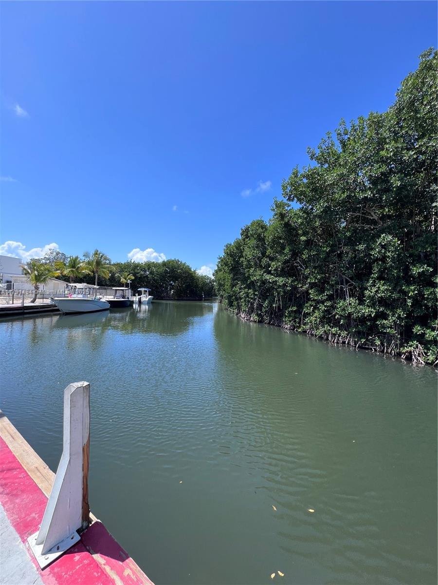 325 Calusa Street, Unit 5 Key Largo, FL 33037 - Photo 13 of 21 a view of a lake with sitting space