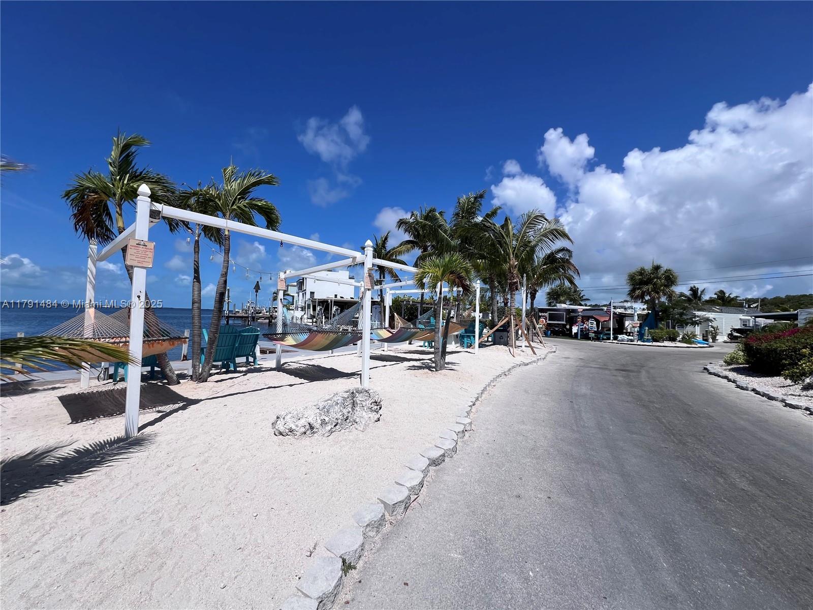 325 Calusa Street, Unit 5 Key Largo, FL 33037 - Photo 15 of 21 a view of a street with cars