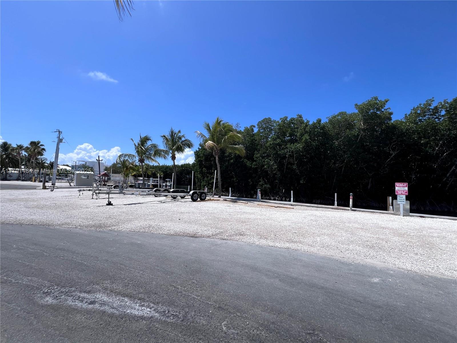 325 Calusa Street, Unit 5 Key Largo, FL 33037 - Photo 16 of 21 a view of a street with a building in the background