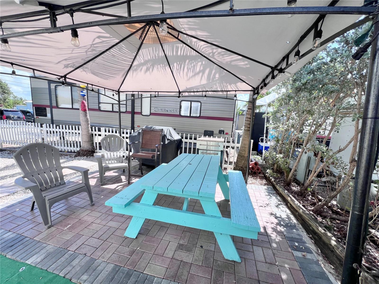 325 Calusa Street, Unit 5 Key Largo, FL 33037 - Photo 8 of 21 a view of outdoor space yard deck and patio