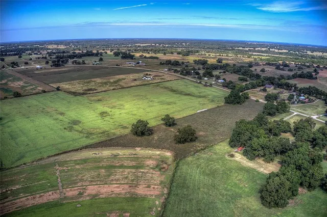 a view of a lake with beach