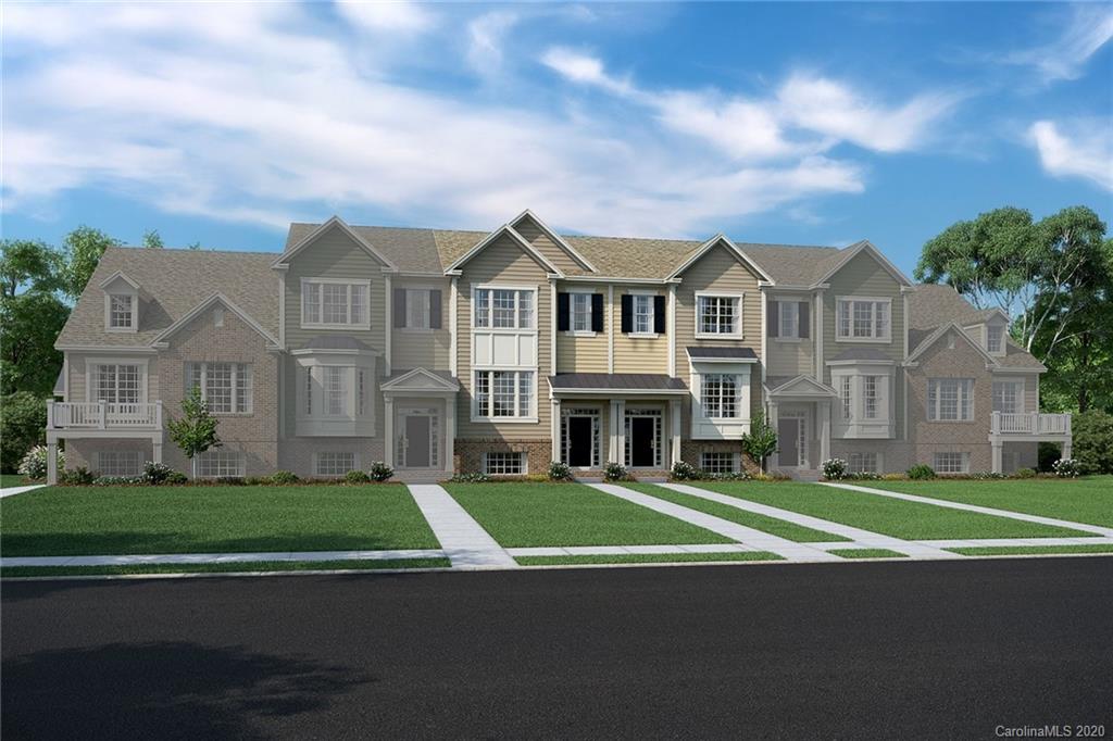 818 Ruckers Court Tega Cay, SC 29708 - Photo 1 of 1 a view of a big house with a big yard and large trees