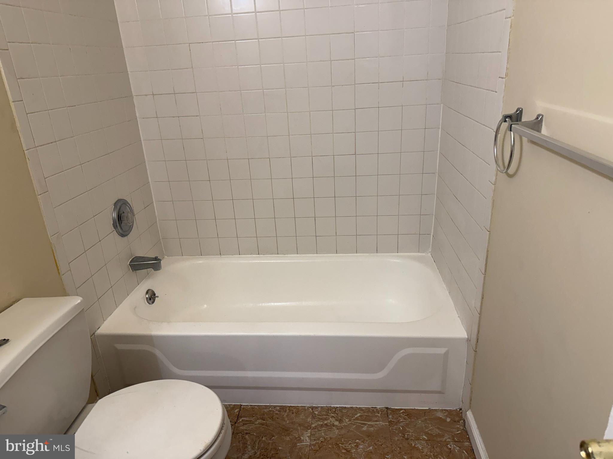 28 Magnolia Court Sicklerville, NJ 08081 - Photo 17 of 19 Modern bathroom with clean, tiled elegance.
