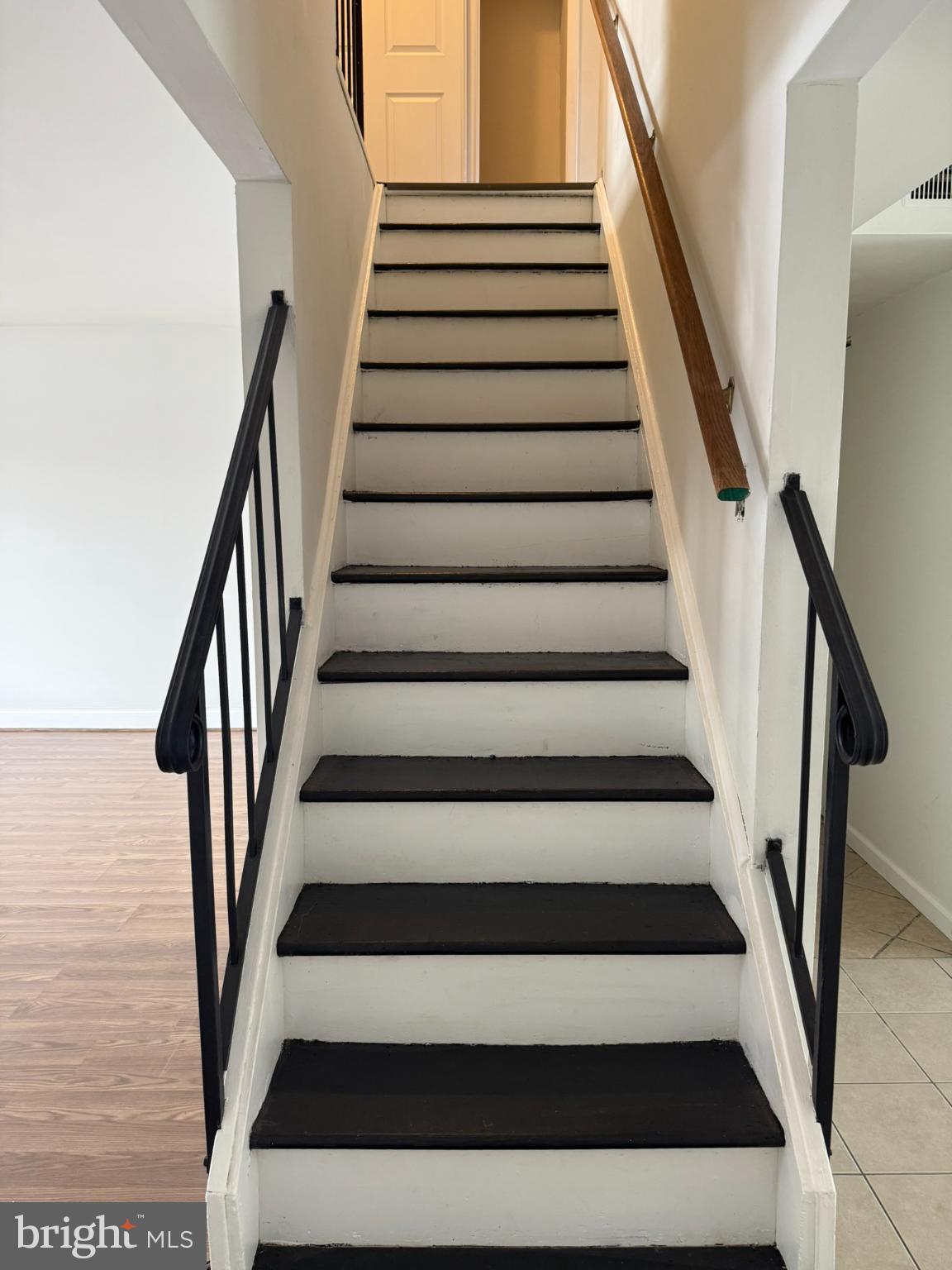 28 Magnolia Court Sicklerville, NJ 08081 - Photo 19 of 19 Inviting staircase with modern railings.