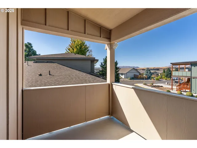 a view of a living room with a large window