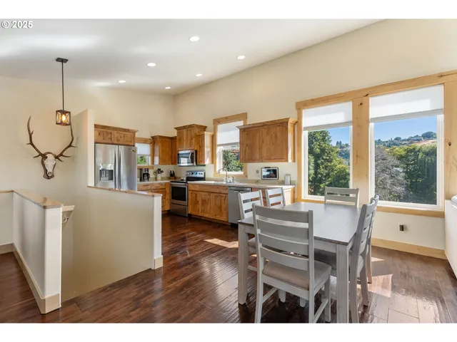 a dining room with furniture window wooden floor