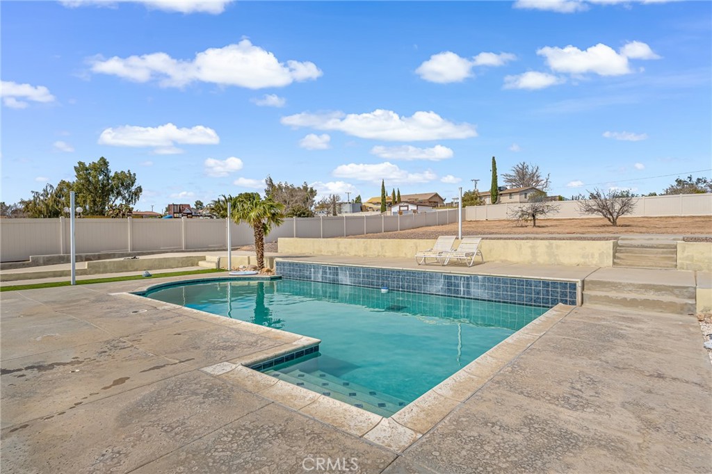 19084 Rock Springs Road Hesperia, CA 92345 - Photo 27 of 44 a view of a lake with a big yard