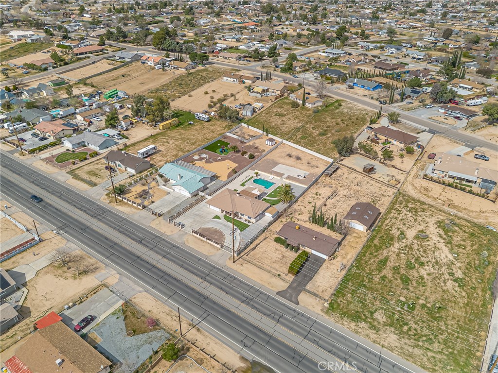 19084 Rock Springs Road Hesperia, CA 92345 - Photo 36 of 44 an aerial view of residential houses with yard