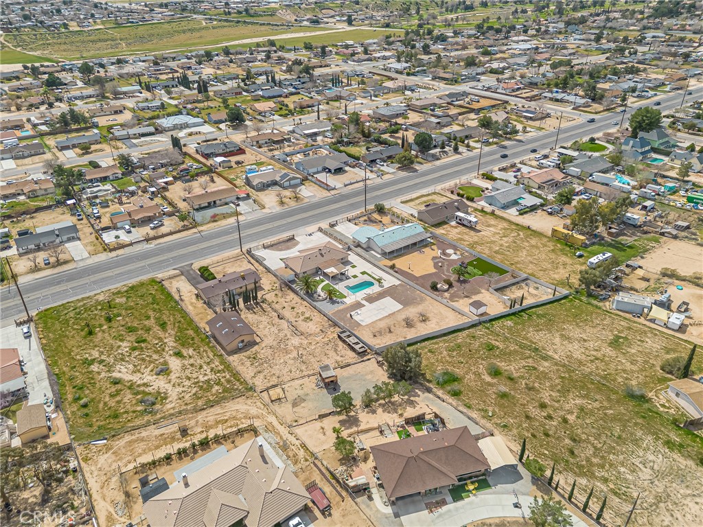 19084 Rock Springs Road Hesperia, CA 92345 - Photo 39 of 44 an aerial view of residential houses with yard