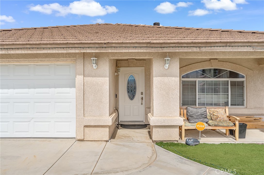 19084 Rock Springs Road Hesperia, CA 92345 - Photo 43 of 44 a view of a house with patio