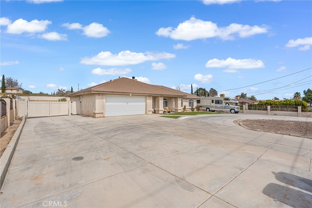 19084 Rock Springs Road Hesperia, CA 92345 - Photo 44 of 44 a view of multiple houses with a street