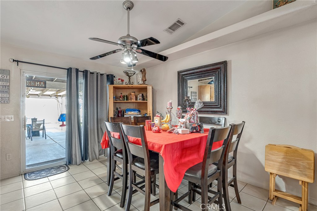 19084 Rock Springs Road Hesperia, CA 92345 - Photo 10 of 44 a view of a dining room with furniture