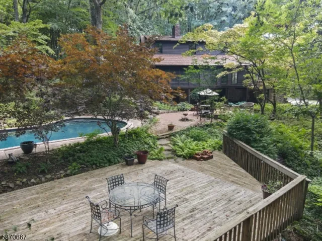 a front view of a house with yard and garage