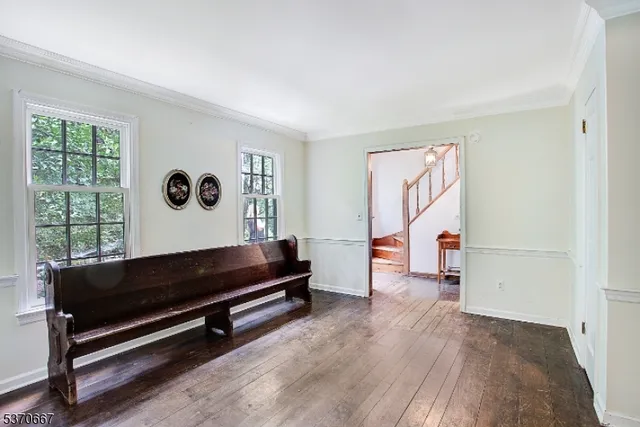 a view of workspace with furniture and window