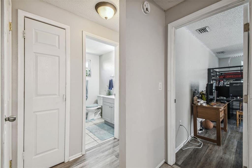 8710 St Regis Lane Port Richey, FL 34668 - Photo 26 of 39 Alcove for guest bedroom, bath and den/office/ third bedroom