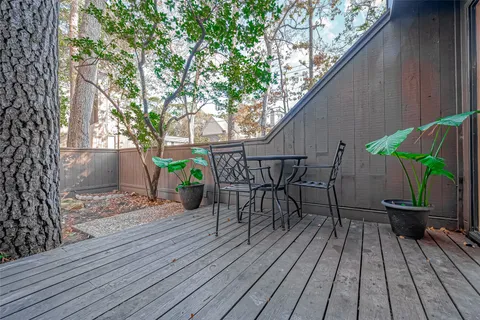 a view of a chairs on the roof deck