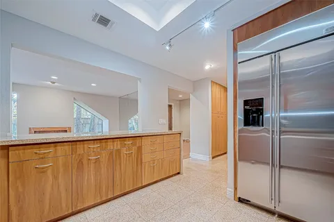 a view of a chairs on the roof deck
