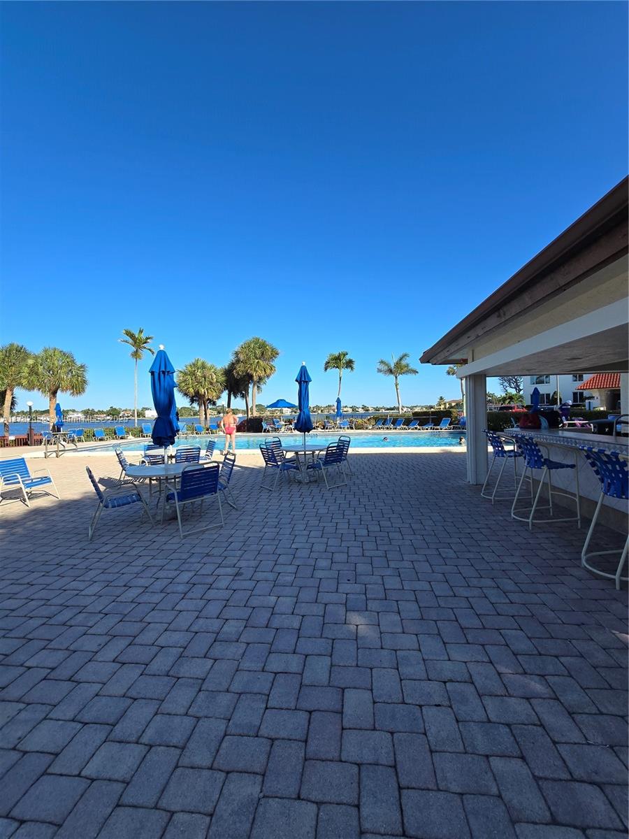 7020 Half Moon Circle, Unit 511 Hypoluxo, FL 33462 - Photo 19 of 28 a view of outdoor space with seating area