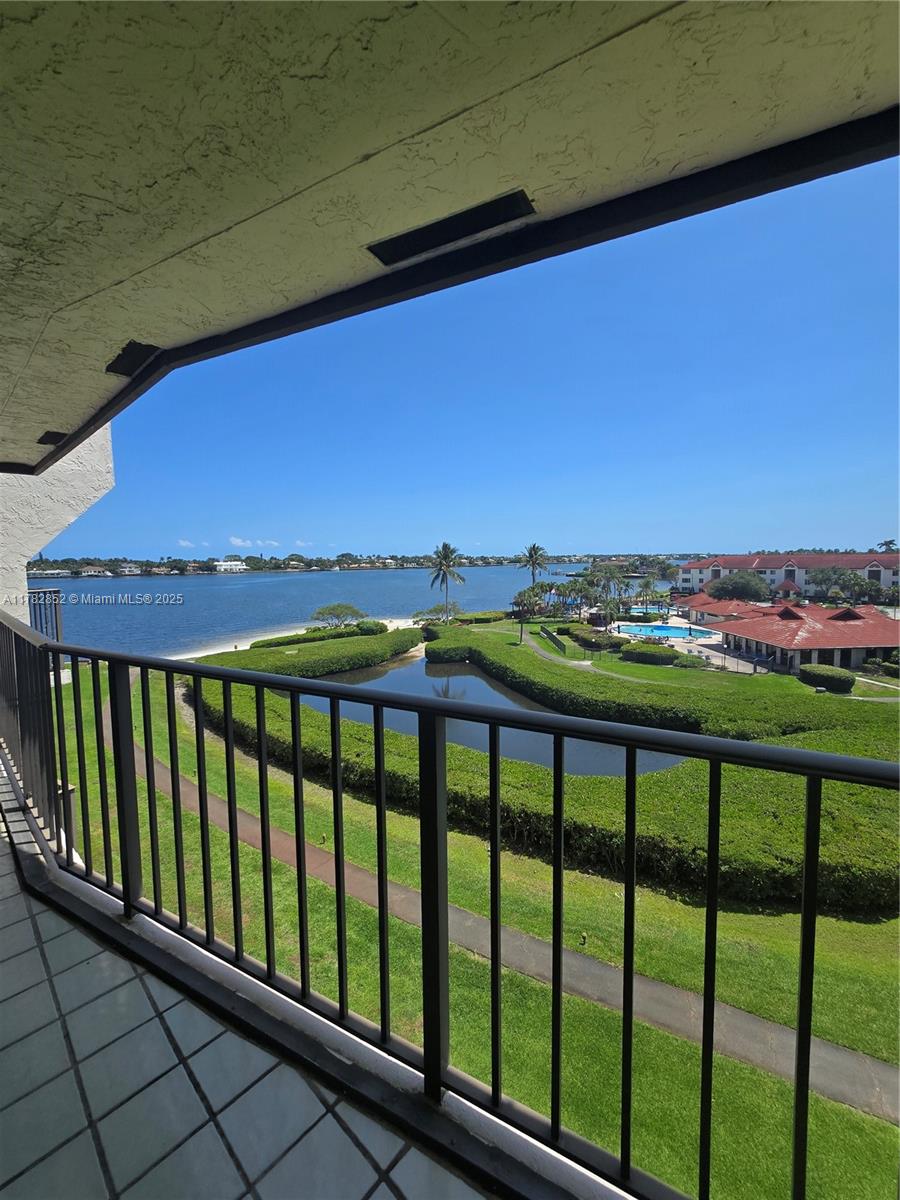7020 Half Moon Circle, Unit 511 Hypoluxo, FL 33462 - Photo 2 of 28 a view of city from a balcony