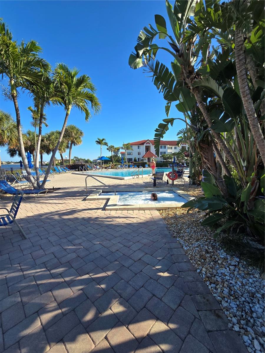 7020 Half Moon Circle, Unit 511 Hypoluxo, FL 33462 - Photo 24 of 28 a view of street with houses