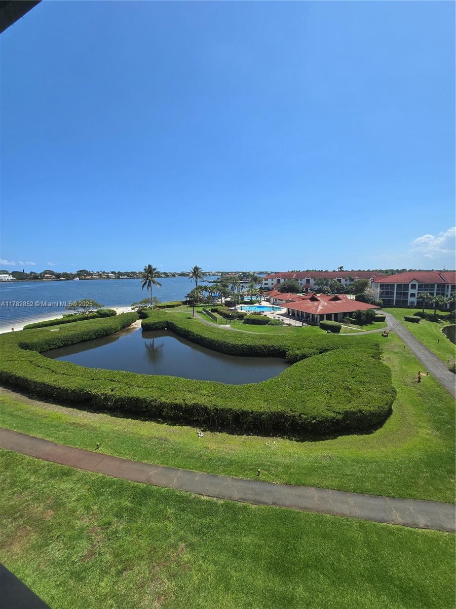 7020 Half Moon Circle, Unit 511 Hypoluxo, FL 33462 - Photo 4 of 28 a view of a city with lawn chairs