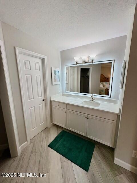 17 Arbor Club Drive, Unit 212 Ponte Vedra Beach, FL 32082 - Photo 17 of 29 a bathroom with a sink and mirror