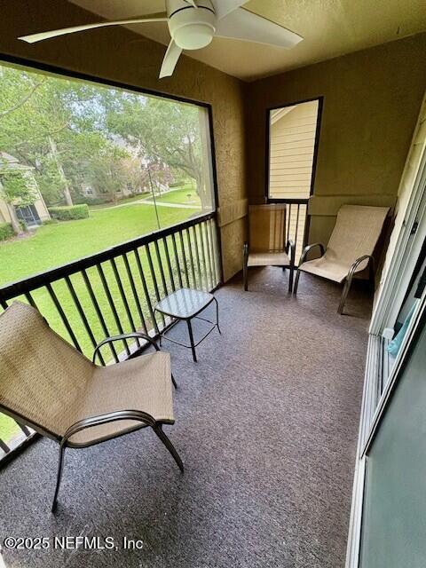 17 Arbor Club Drive, Unit 212 Ponte Vedra Beach, FL 32082 - Photo 27 of 29 a view of a porch with furniture