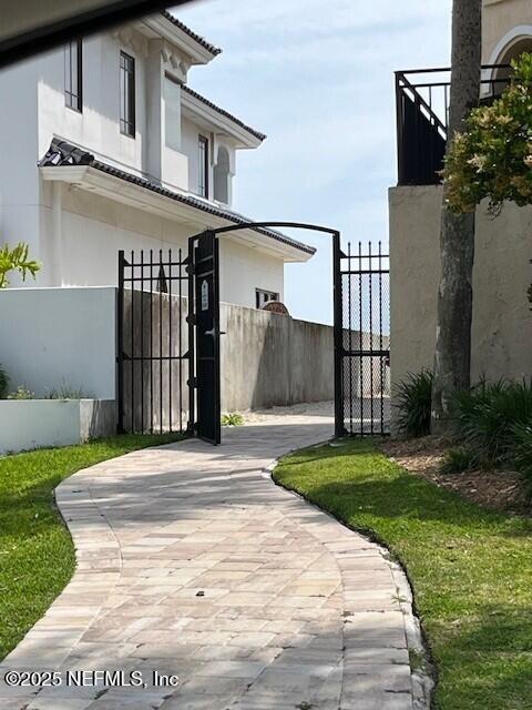 17 Arbor Club Drive, Unit 212 Ponte Vedra Beach, FL 32082 - Photo 29 of 29 a front view of a house with a garden