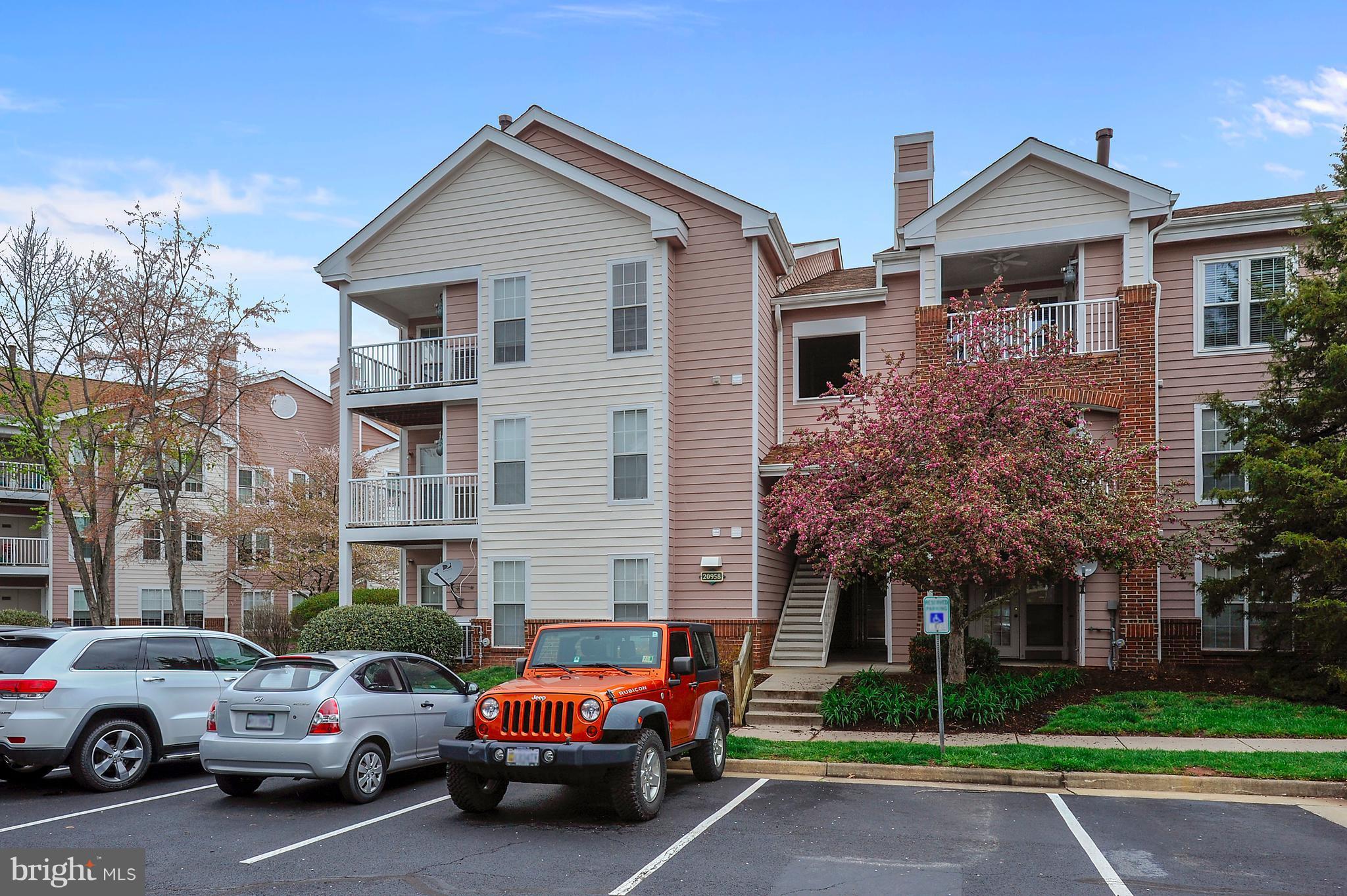 20958 Timber Ridge Terrace, Unit 303 Ashburn, VA 20147 - Photo 1 of 23 Exterior (Front)
